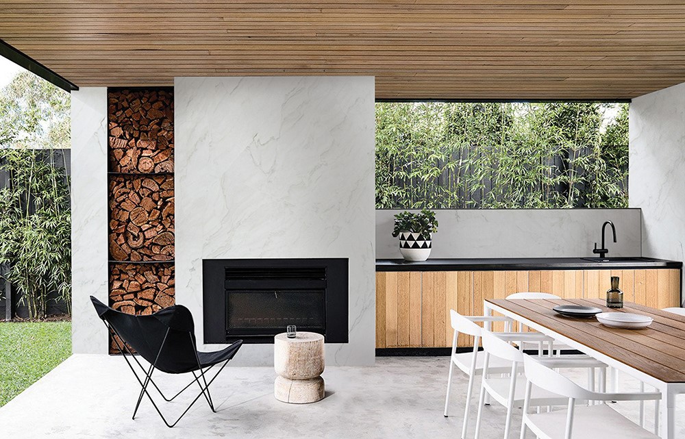 Outdoor fireplace tile installation